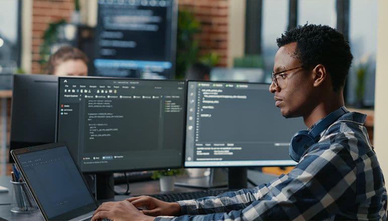 Image of a man coding